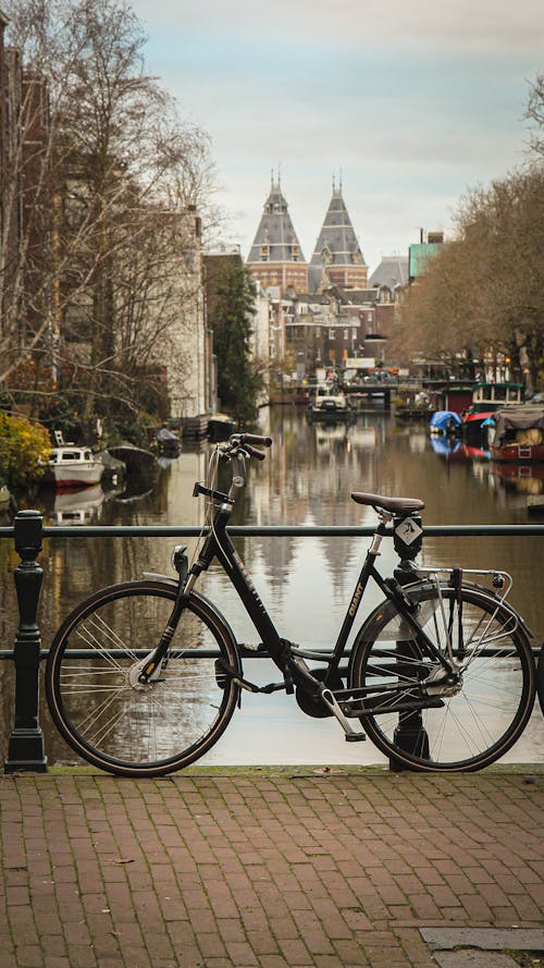 A Bicycle Parked on a Metal Railings