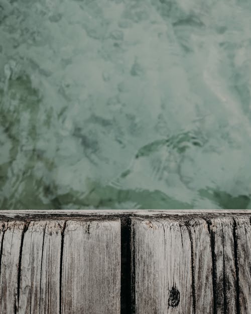 Free Brown Wooden Dock over Green Water Stock Photo