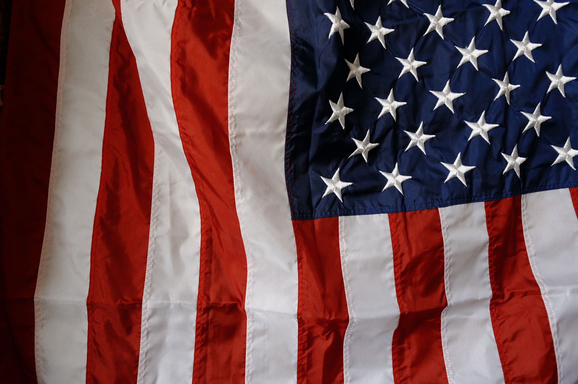 Detailed view of the United States flag showcasing stars and stripes representing national pride.
