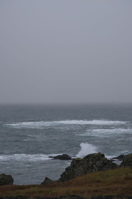 Cover of The Salt Compass — storm surf on a rocky headland, photo by Vitaly Kushnir on Pexels
