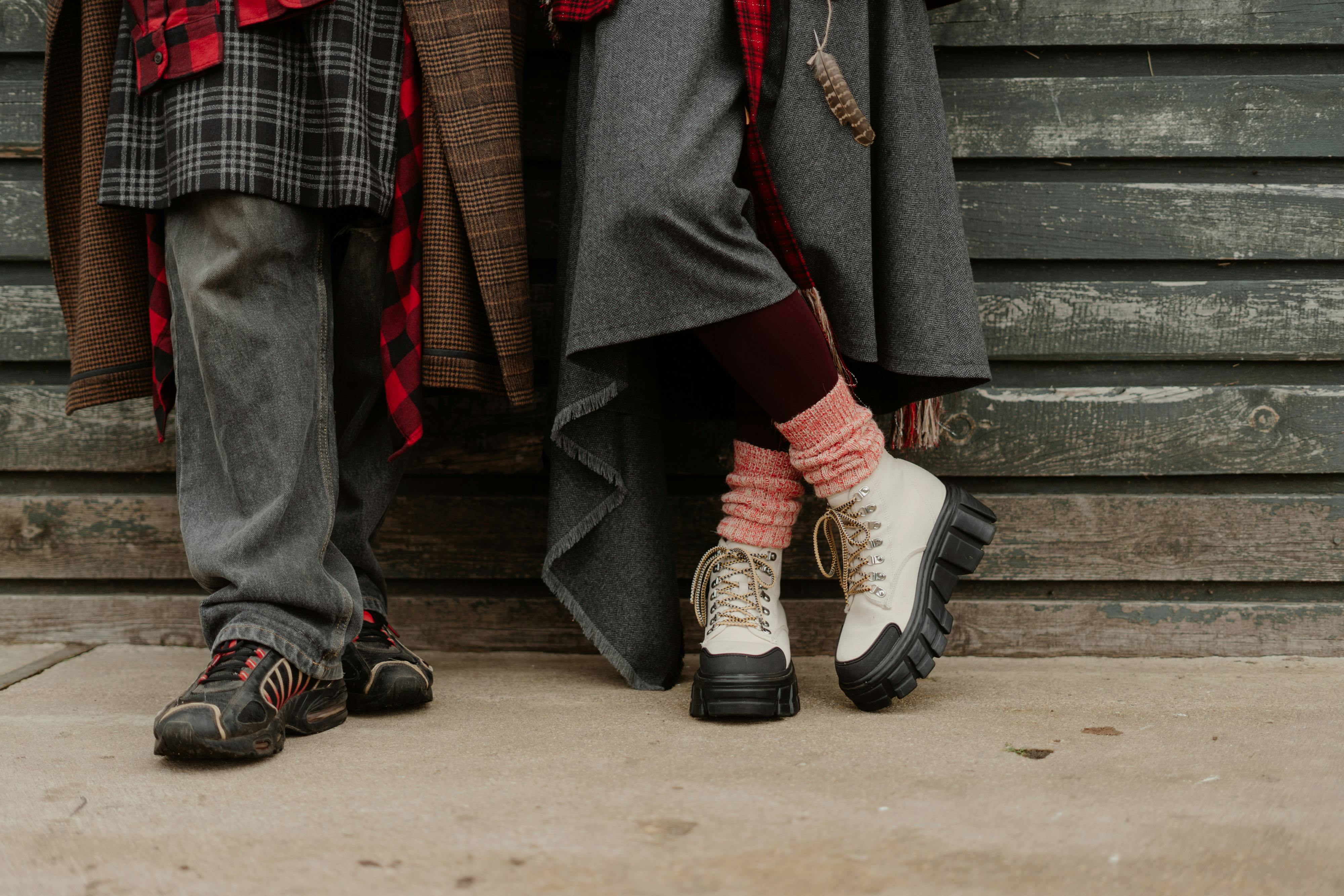 couple wearing trekking shoes