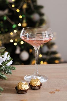 Clear Wine Glass With Red Liquid on Brown Wooden Table