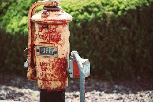 Red and Beige Metal Pipe