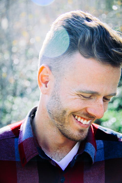 Close-Up Photography of a Smiling Man