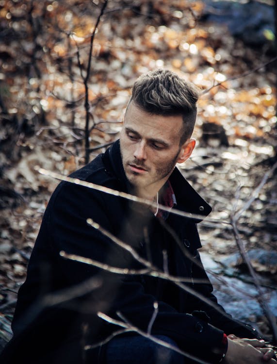 Free Close-Up Photography of a Man Wearing Black Coat Stock Photo