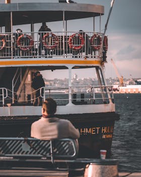 Scenic view of a passenger ferry traversing the Bosphorus in Istanbul, showcasing maritime travel.