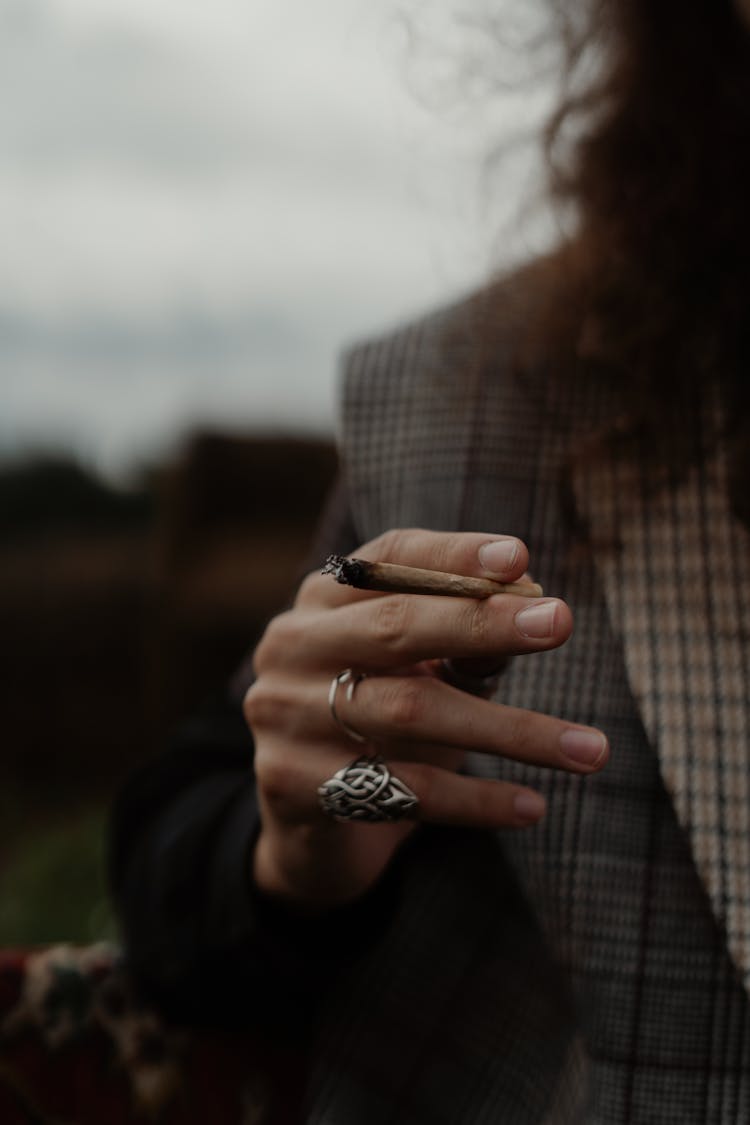 Hand Of Woman Smoking Marijuana