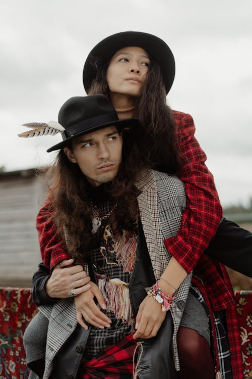 A Man and Woman in Checkered Coats