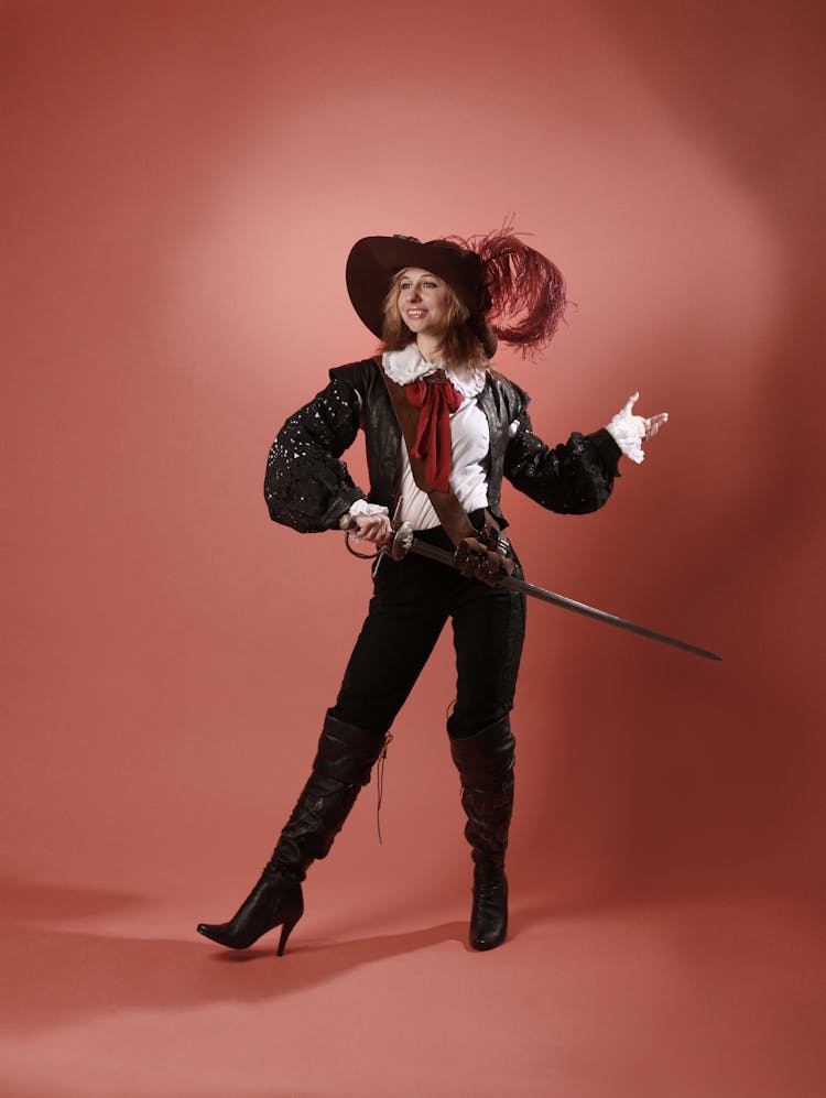 A Musketeer Holding A Sword