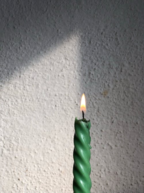 Close-Up Shot of a Burning Candle 
