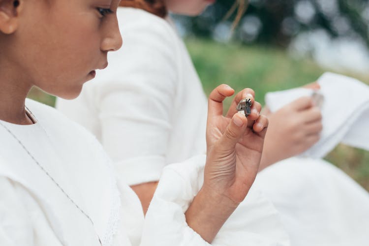 Girl Looking At Gemstone