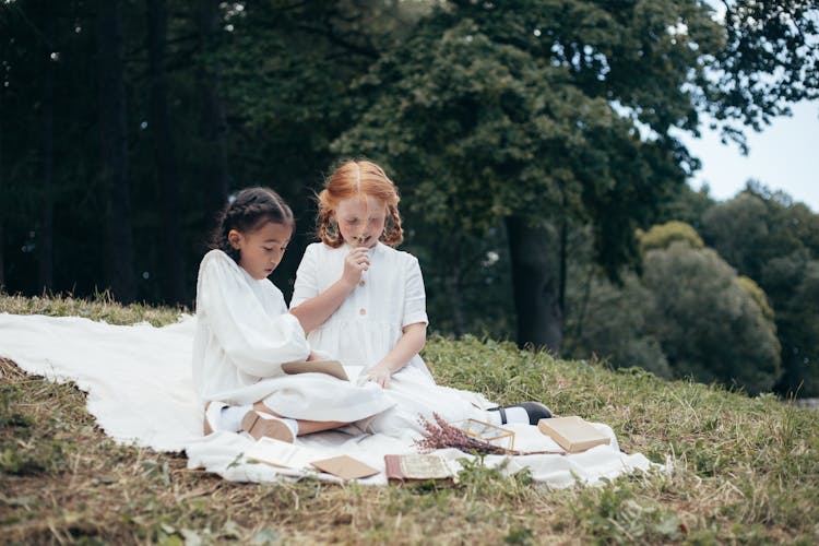 Two Girls In White Dresses In Park