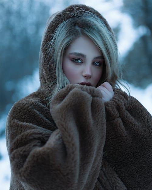 Portrait of Beautiful Woman in Brown Fur Coat