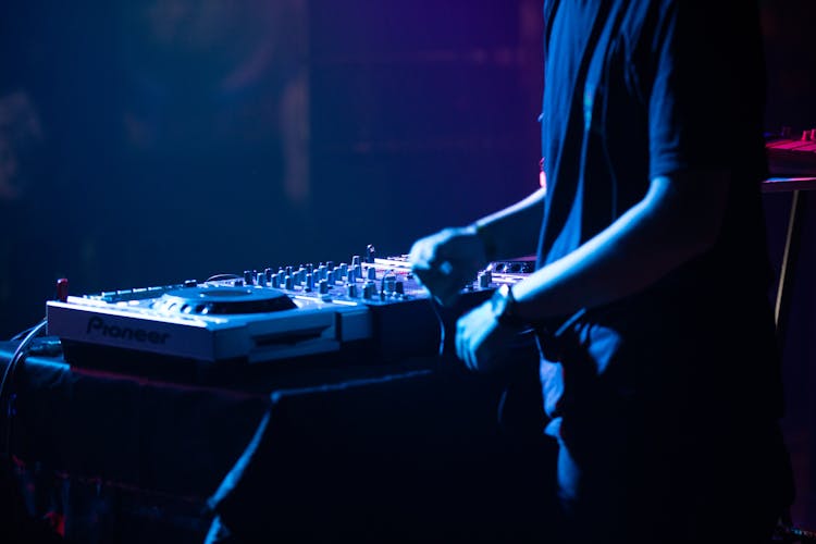 Man With Dj Console In Club