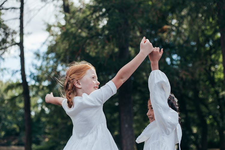 Two Girls Doing Pinky Swear