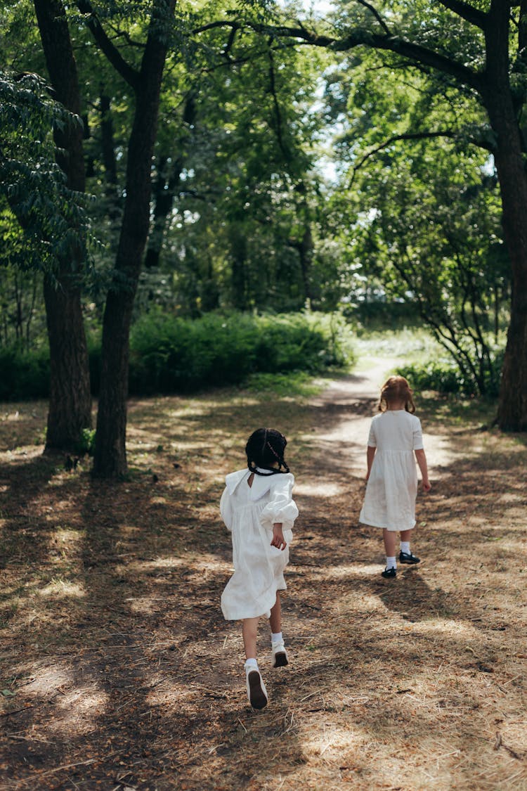 Girls In White Dresses Walking