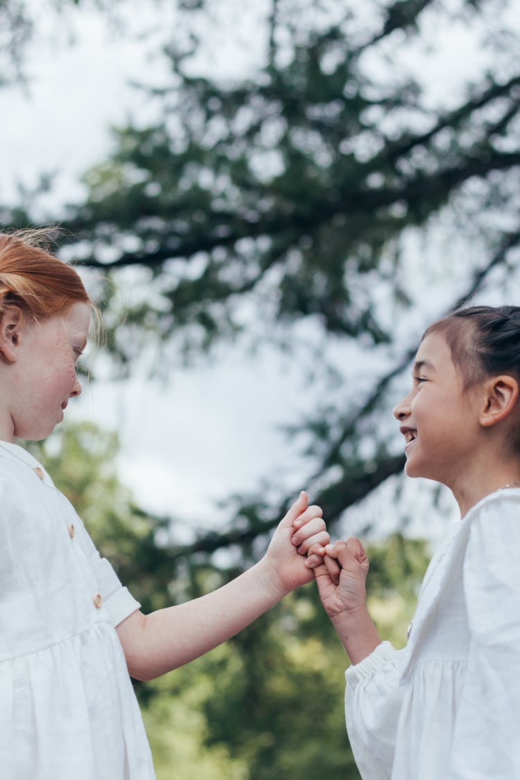 Two Friends Doing Pinky Swear