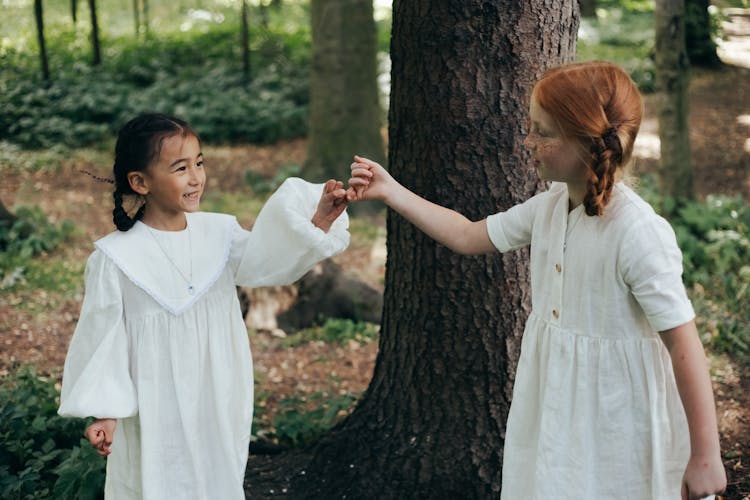 Two Friends Doing Pinky Swear