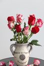 Pink Roses in Brown Ceramic Vase