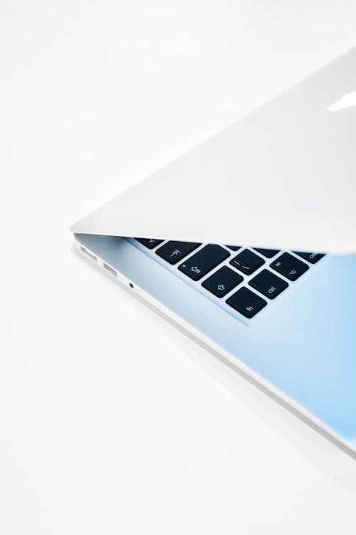 A Close-Up Shot of a Laptop on a White Background