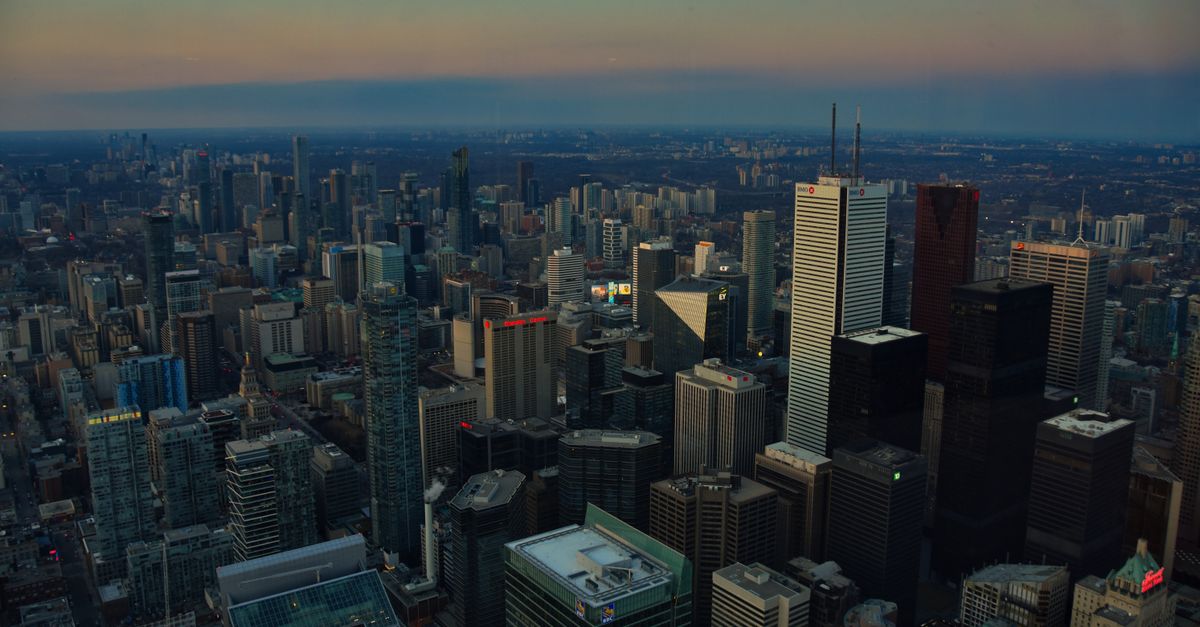 Toronto condo towers against the skyline where many investors face negative cash flow