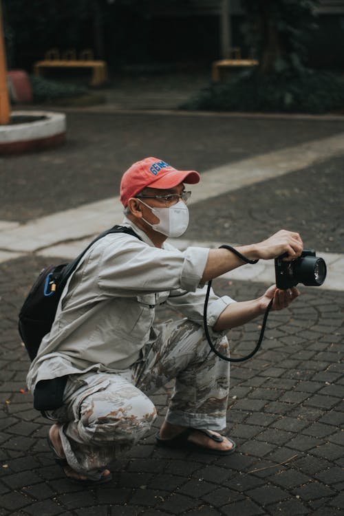 A Man Holding a Camera