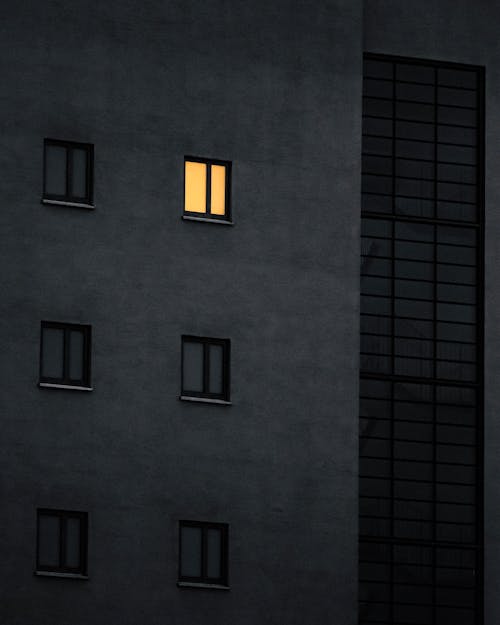 Light in One Window in Block of Flats 