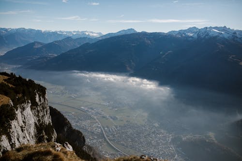 Aerial Photography of Town Between Mountains