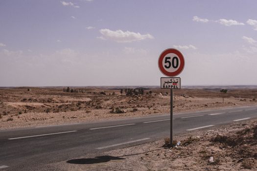 A Speed Limit Sign by the Road