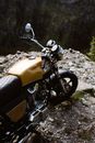 Yellow and Black Motorcycle on Dirt Ground