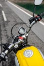 Yellow and Black Motorcycle on Road