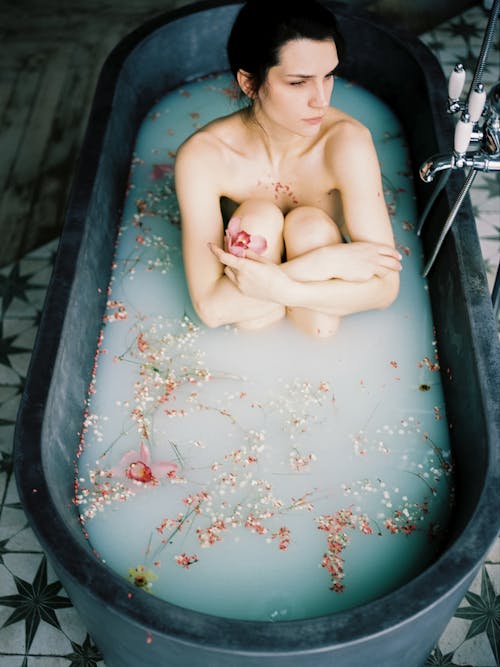 Free Naked Woman Sitting in Bathtub Stock Photo