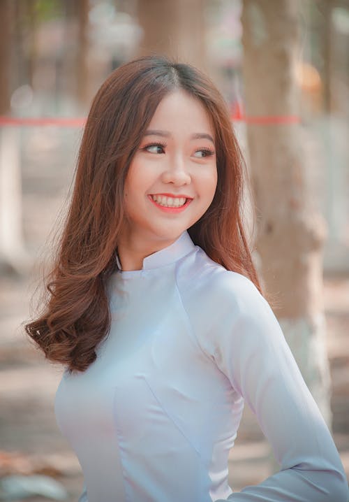 Close-Up Photography of a Smiling Woman