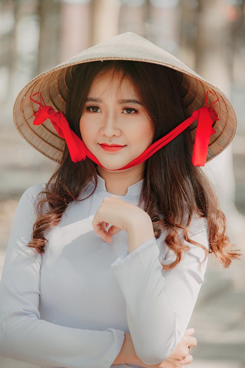 Photo Woman Hiding on Asian Conical Hat · Free Stock Photo