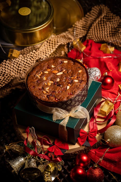 Free Chocolate Cake with Nuts on a Gift Box Stock Photo