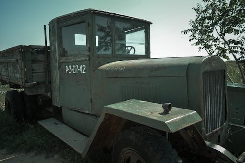 A Green and Brown Vintage Truck