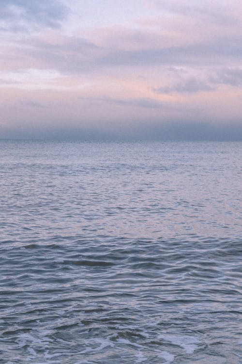 Seascape Scenery under Cloudy Sky