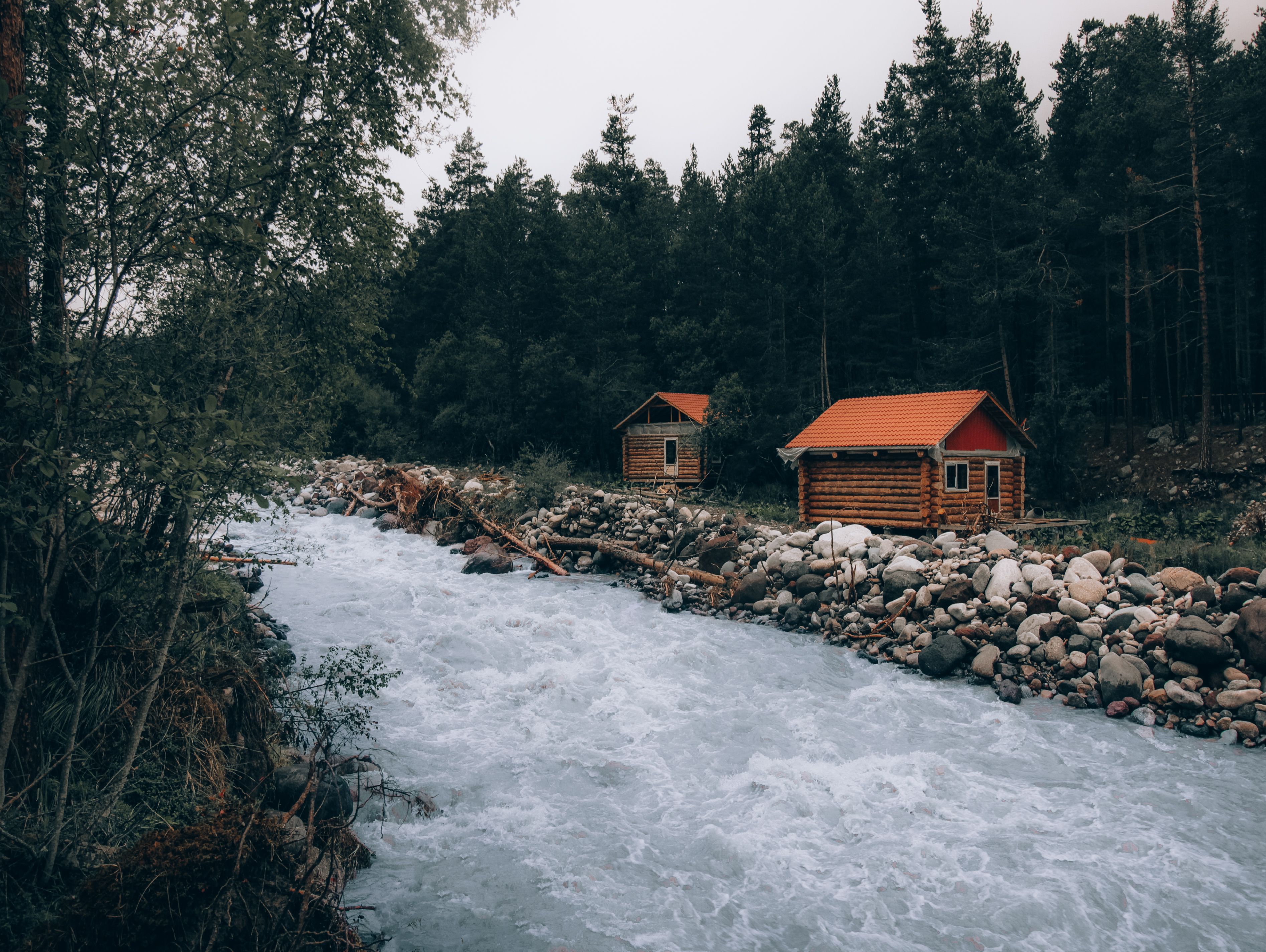 Brown Wooden Houses Near River · Free Stock Photo