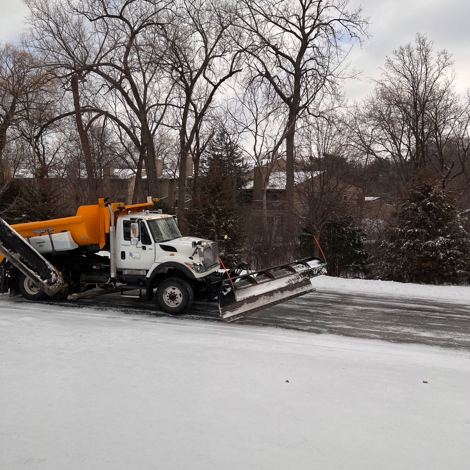 TurnKey Property Maintenance crew clearing snow at a Western New York property