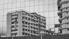 Grayscale Photo of Concrete Building