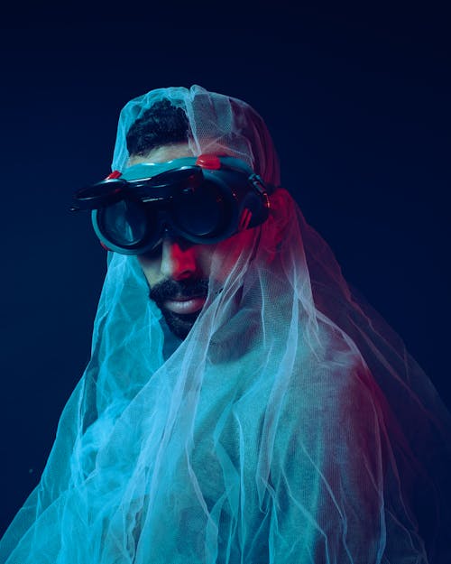 Bearded Man Wearing Goggles and Veil