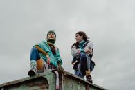 3 Women in Blue Jacket and Green Scarf