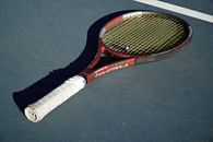 Red and Black Tennis Racket