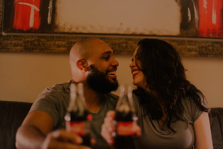 Close-Up Photography Of Couple Laughing