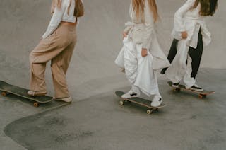 Women Riding Skateboard on the Skatepark