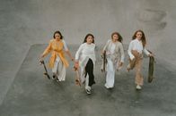 Ladies Holding Skateboard