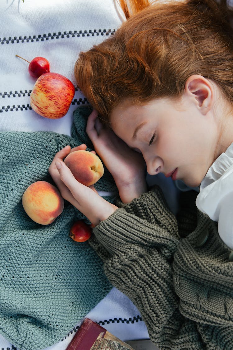 Woman Lying Down With Apples