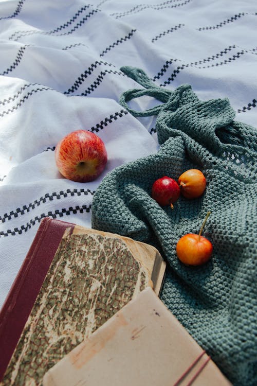 Close up on Apples on Blanket and Clothes