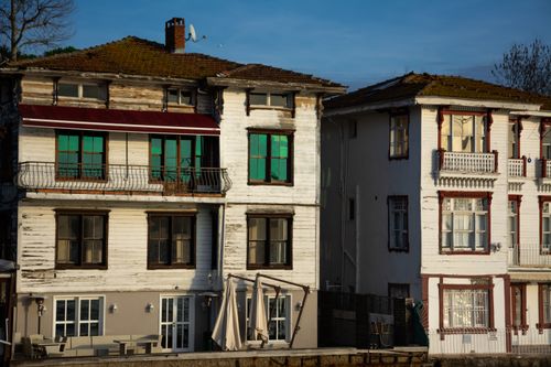 Free Two historic buildings with weathered facades showcasing architectural decay and charm. Stock Photo