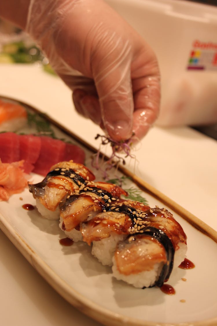 Hand Preparing Meal